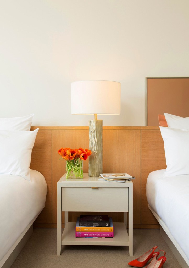 Luxury Double King beds and sidetable

